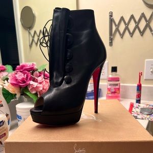 Christian Louboutins black booties